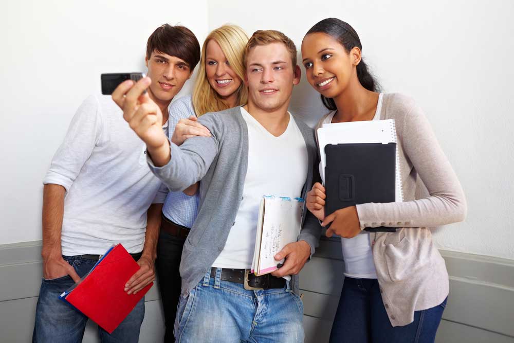 Students taking a group selfie