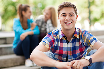 Happy teenager feeling upbeat at a therapeutic facility for struggling teenagers