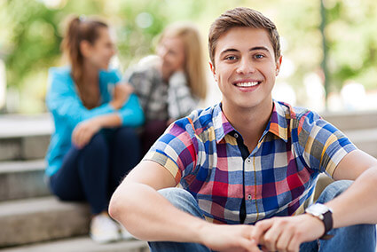Happy young adult male feeling upbeat at Independent Living treatment program for young adults