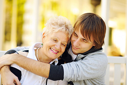 Happy young adult male feeling confident at Independent Living therapeutic center for troubled young adults