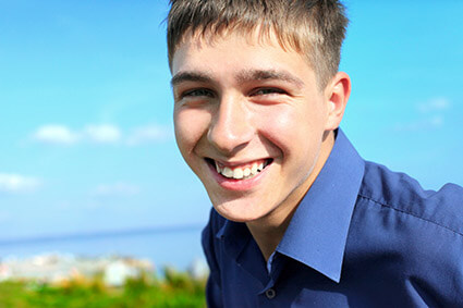 Enthusiastic young adult male feeling hopeful at Independent Living treatment center for struggling young adults