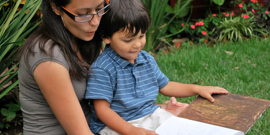 Image of special education teacher helping child