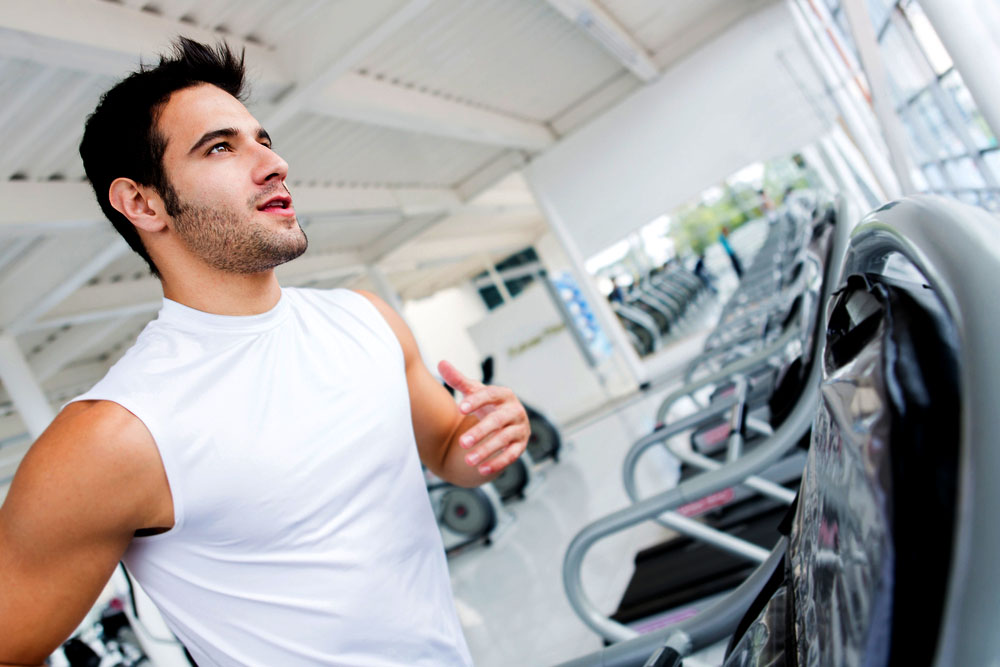 Athlete exercising on treadmill