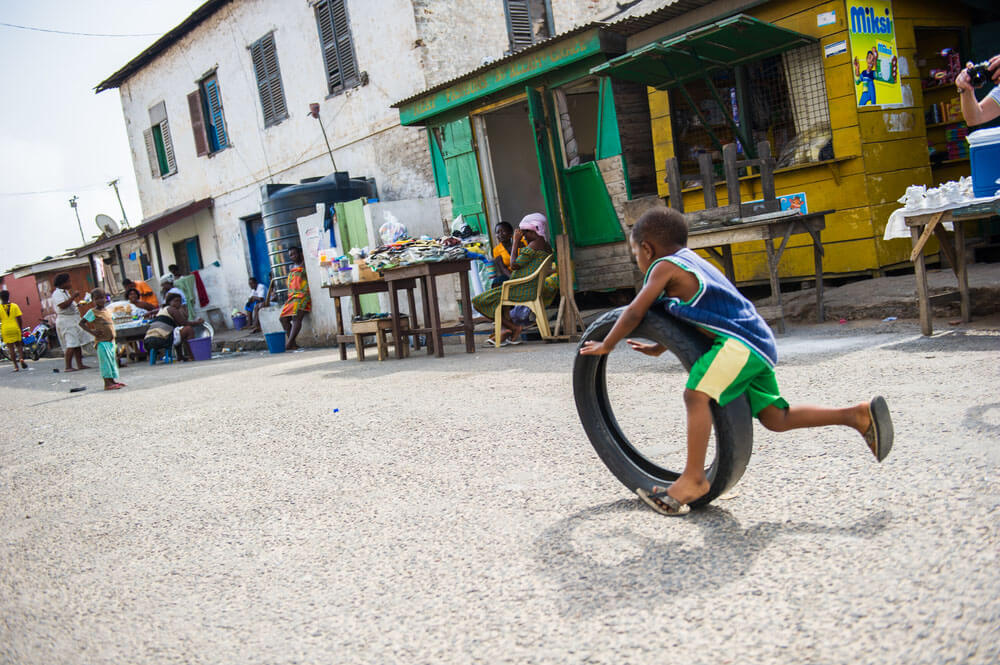 Boy playing in the street
